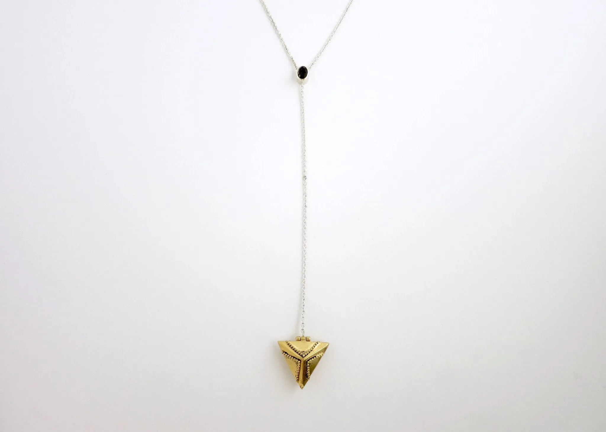 Dainty, long, bi-metal lariat necklace with gold plated brass triangular locket on sterling silver chain