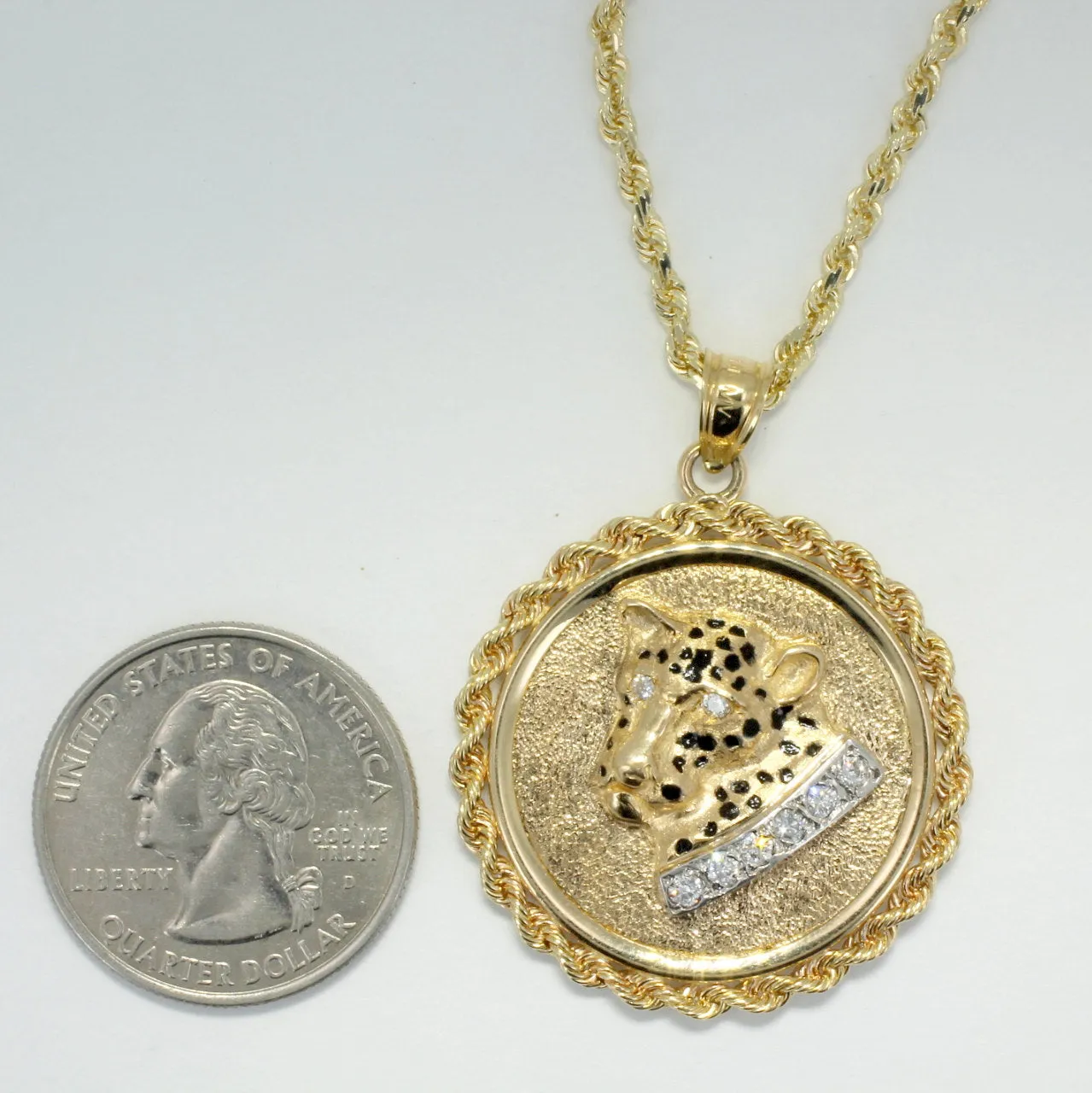 Jaguar Coin Medallion Necklace in 14kt Yellow  Gold on 18"  Rope chain.