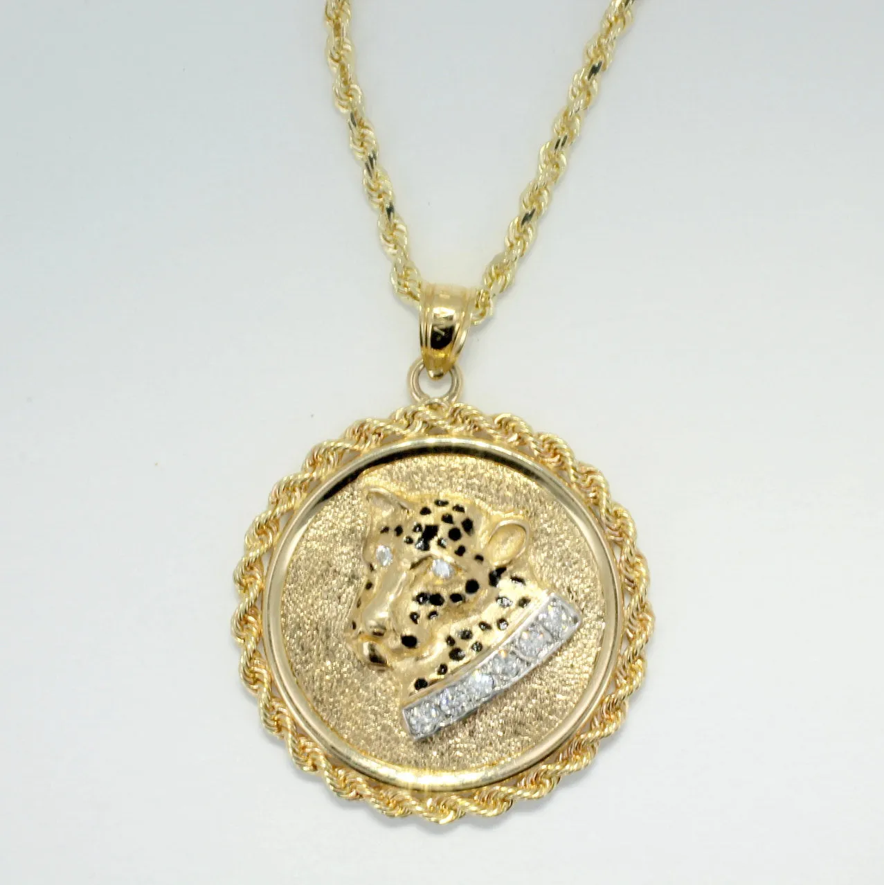 Jaguar Coin Medallion Necklace in 14kt Yellow  Gold on 18"  Rope chain.