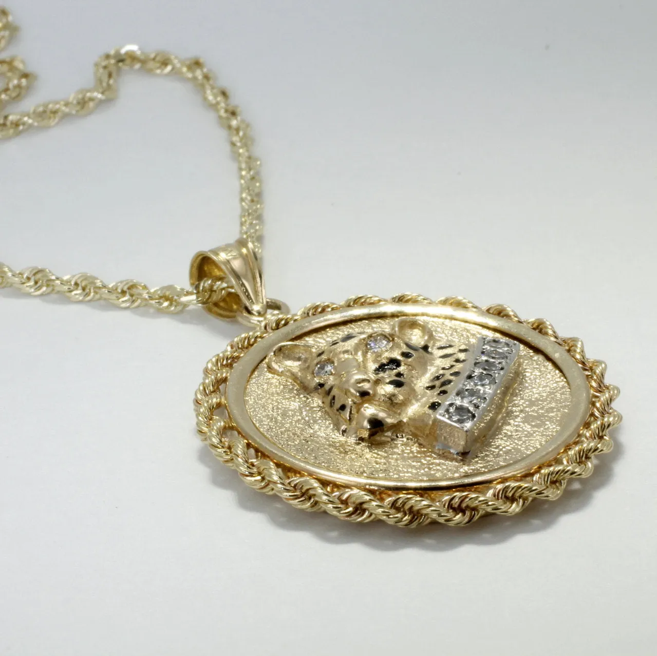 Jaguar Coin Medallion Necklace in 14kt Yellow  Gold on 18"  Rope chain.