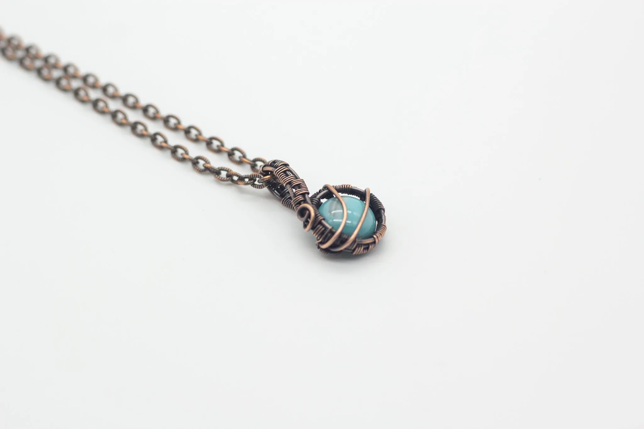 Streaked Blue Fused Glass Mini Pendant with Copper Wire Wrapping